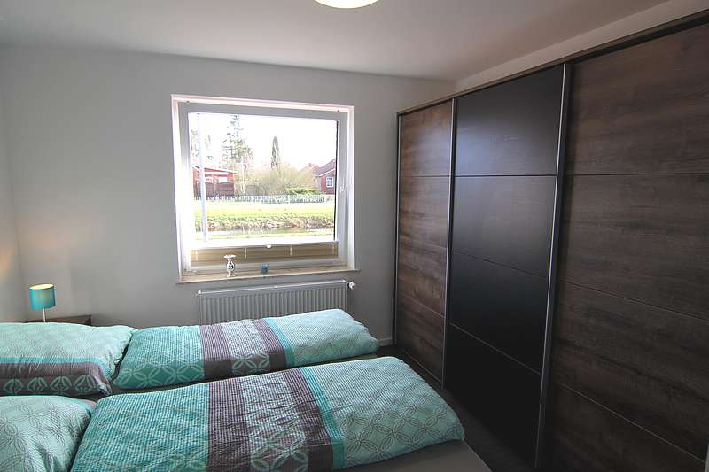 Erstes Schlafzimmer der Ferienwohnung wiekenhuus.